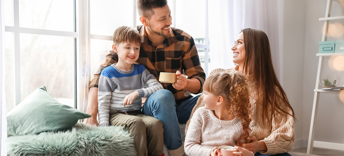 Happy family resting at home