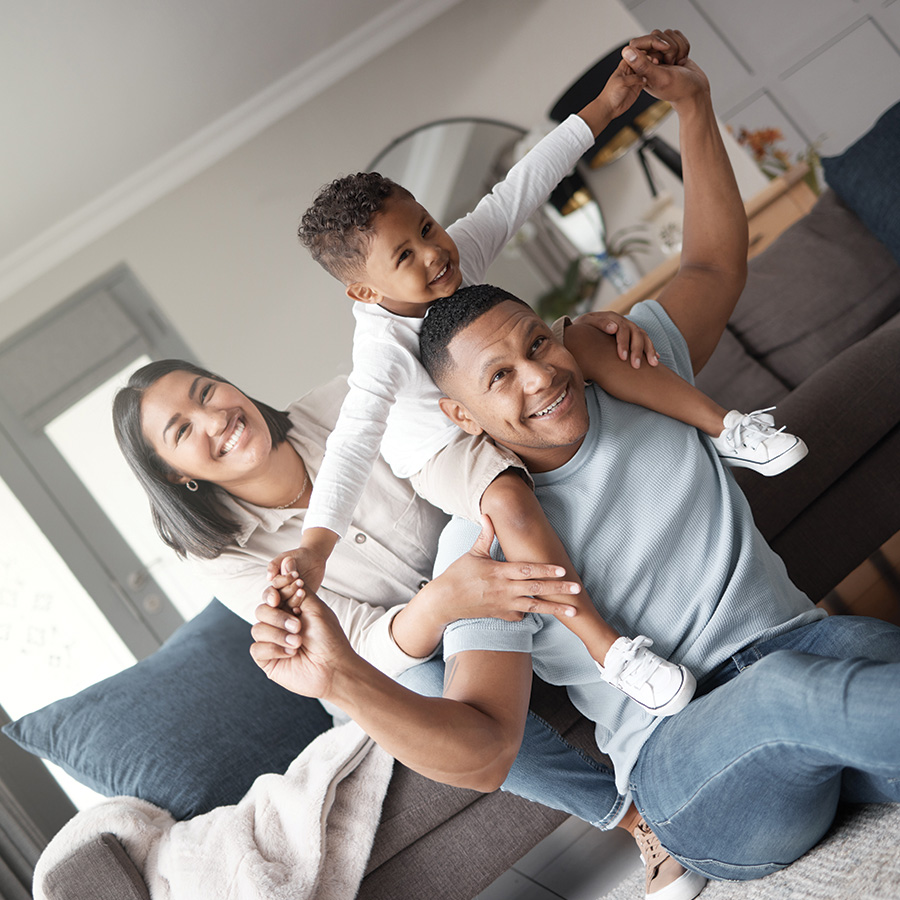 a happy mixed race family of three relaxing on the 2023 11 27 04 52 16 utc