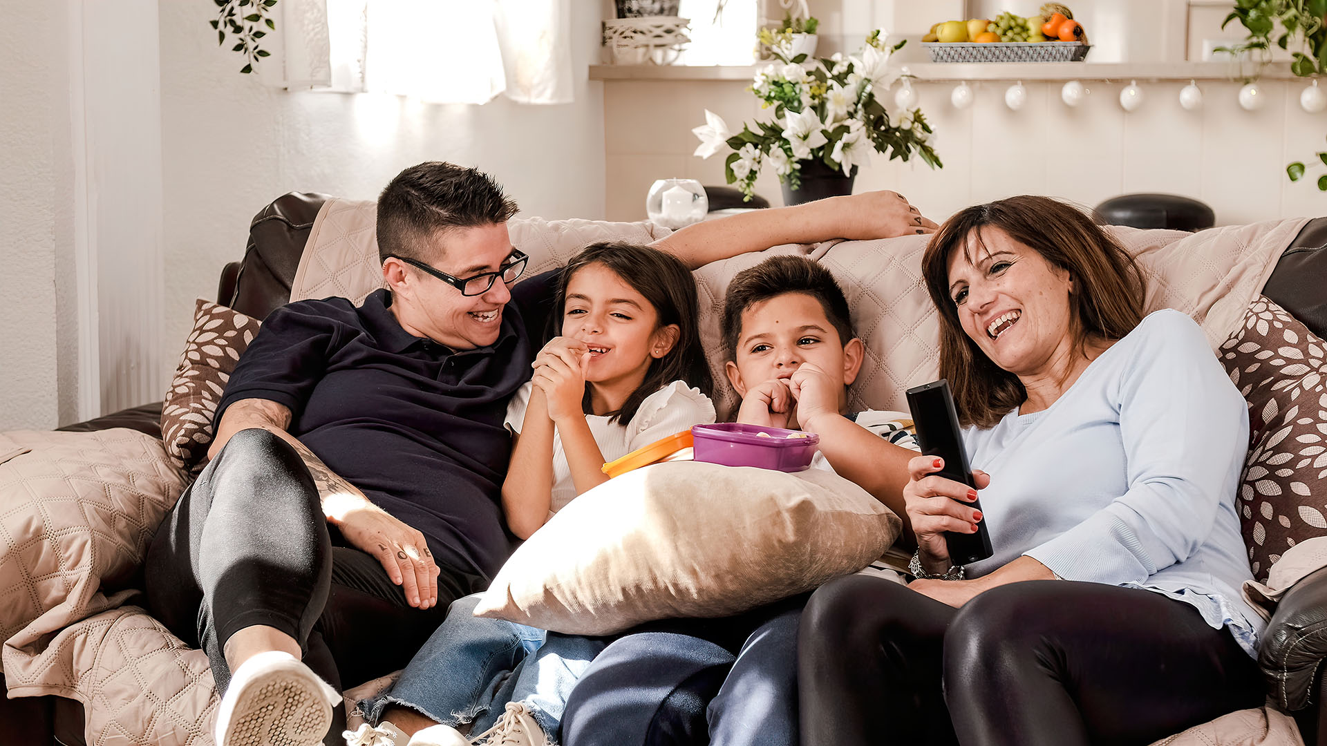 relaxed family watching tv at home 2024 03 05 17 05 07 utc